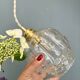 Suspension globe vintage en verre moulé transparent