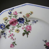 4 flat plates by Bernardaud, Limoges porcelain, floral decoration from the 1920s to 1950s.