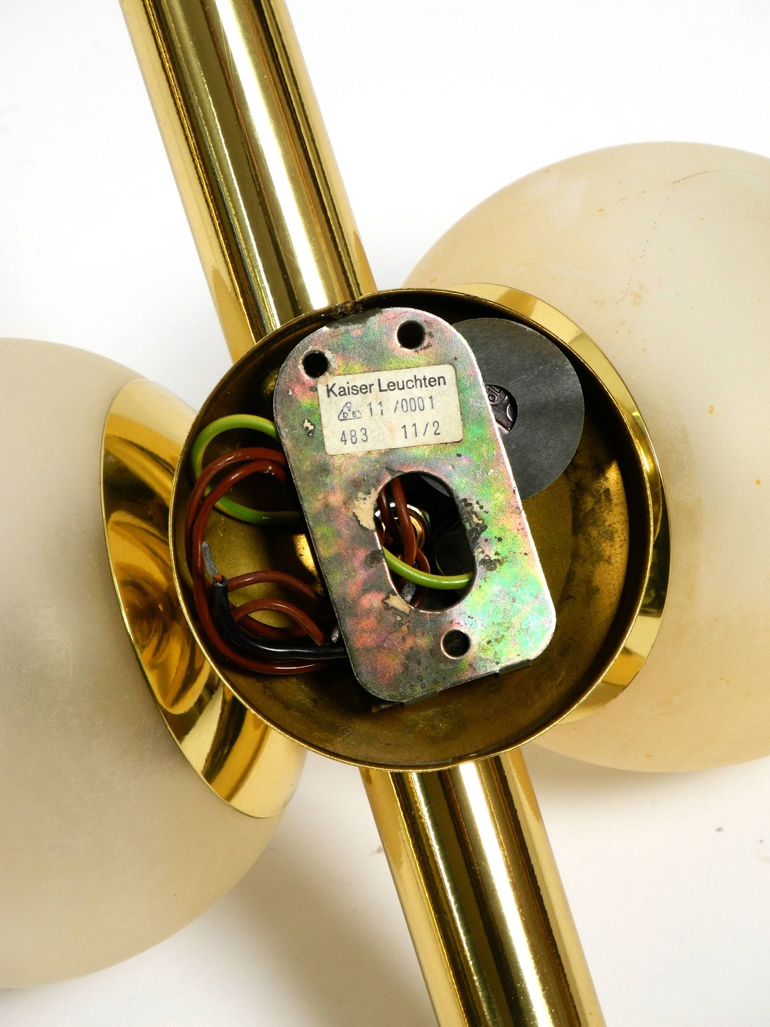 Pair of beautiful 60s Kaiser brass wall lamps with two golden glass spheres