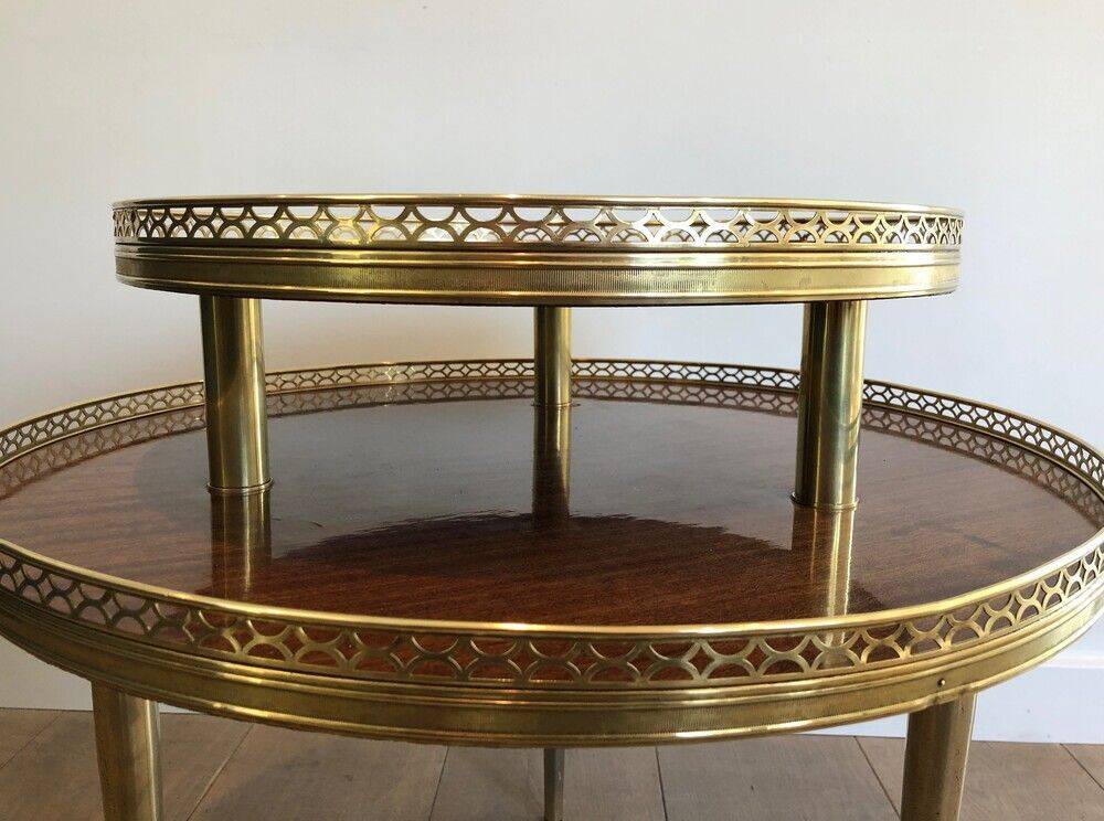 Tripod gueridon in neoclassical style made of mahogany, brass, and a golden metal base.