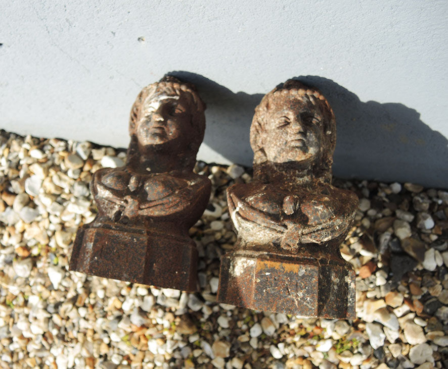 Old cast iron chenets bust of woman with braids