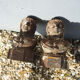 Old cast iron chenets bust of woman with braids