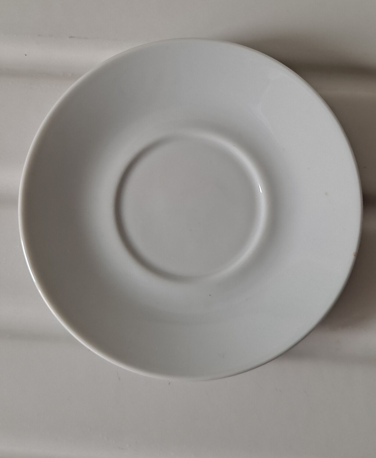 Trio of mismatched white cups