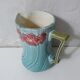 Antique Art Deco turquoise flowered slipware jug vase