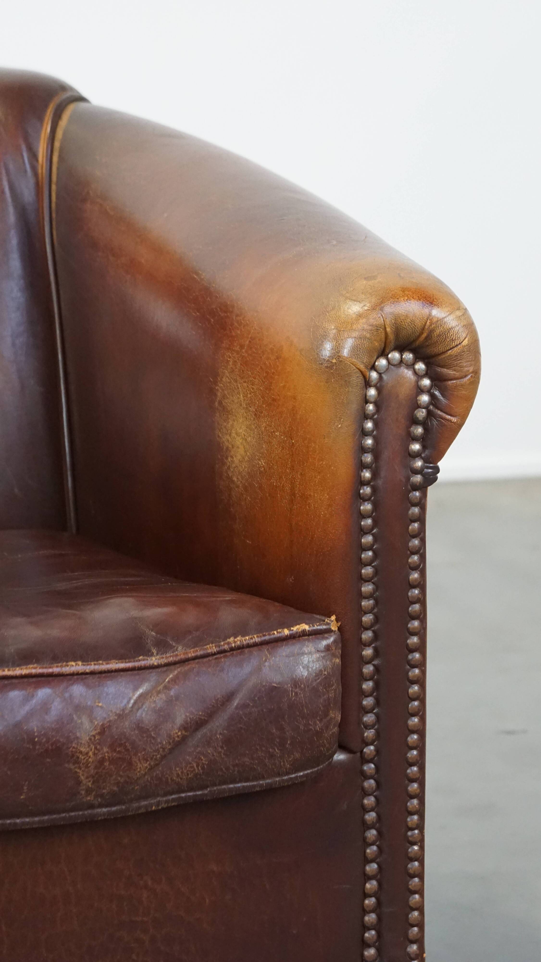 Vintage club armchair made of sheep leather