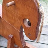 Rocking horse in raw and glazed wood