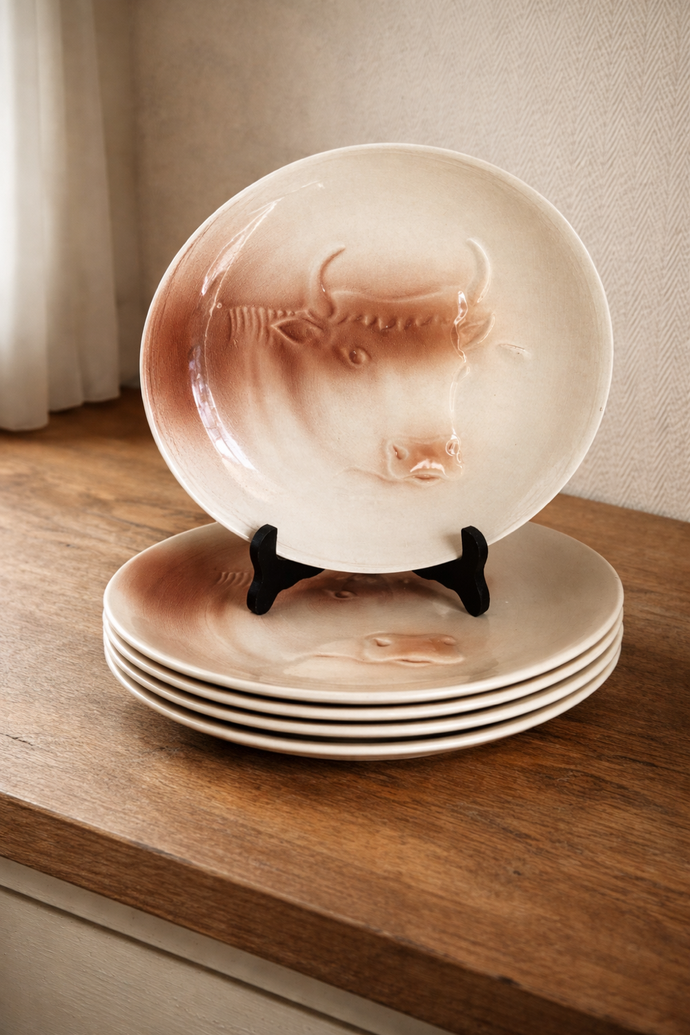 Saint Amand plates with cow head decoration.