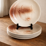 Saint Amand plates with cow head decoration.