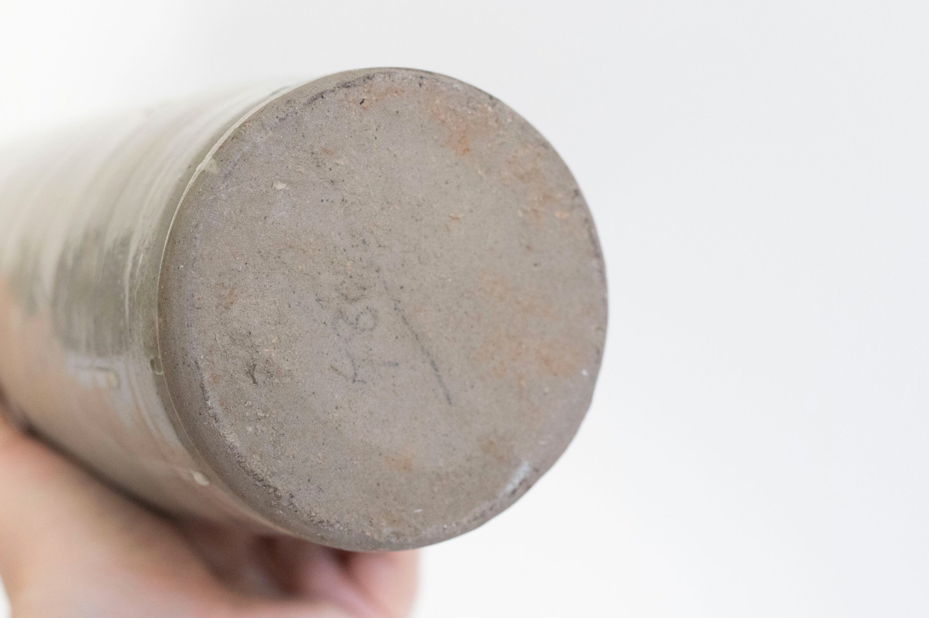 Bottle of enamelled stoneware hot water bottle