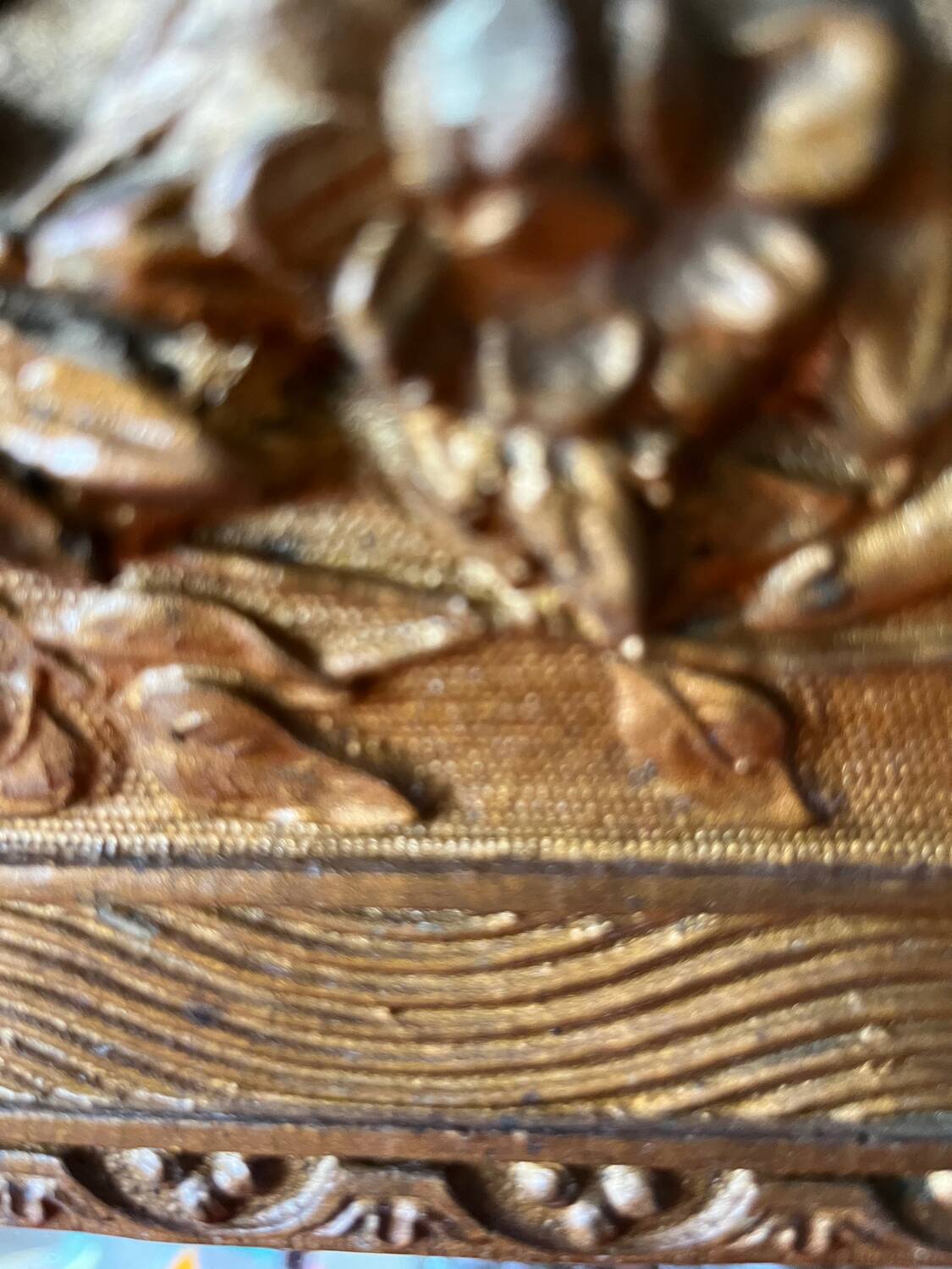 Golden trumeau mirror for fireplace, late 19th century, with sculpted pediment.