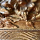 Golden trumeau mirror for fireplace, late 19th century, with sculpted pediment.