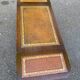 Victorian English extendable coffee table made of solid mahogany and leather.