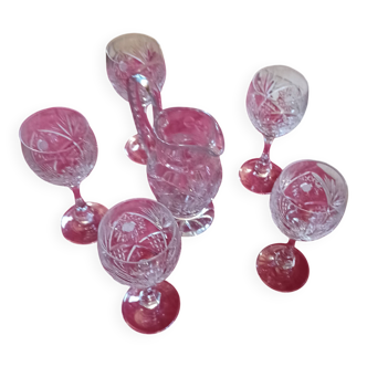 Crystal wine glasses cut by Baccarat with a jug.