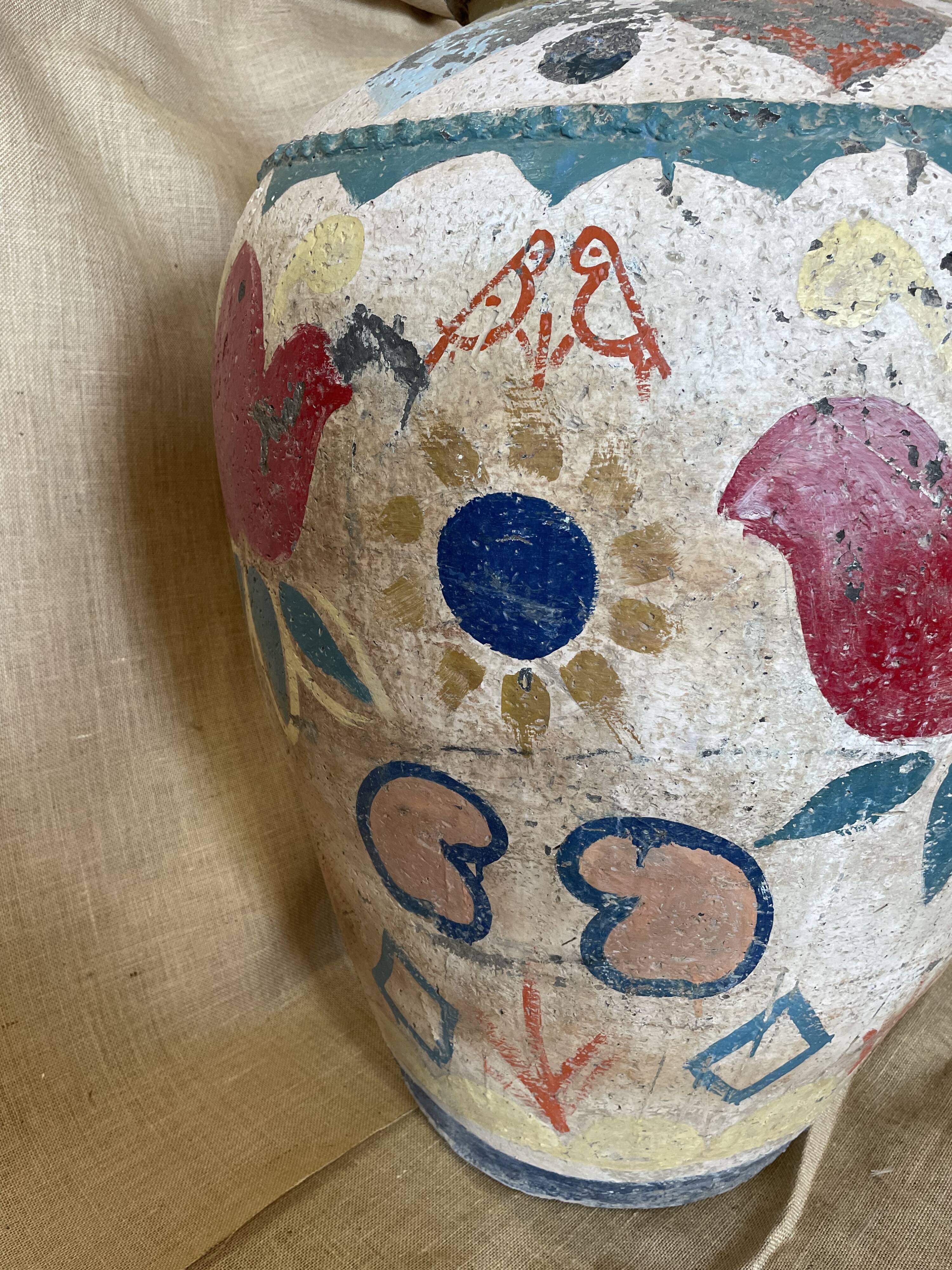 Polychrome decorated terracotta jar