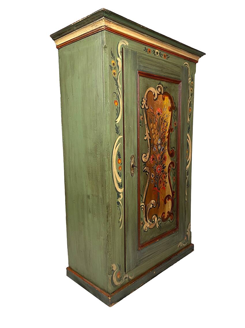 Alsatian bonnet maker in painted softwood with floral decorations