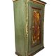 Alsatian bonnet maker in painted softwood with floral decorations