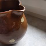 Stoneware pitcher.