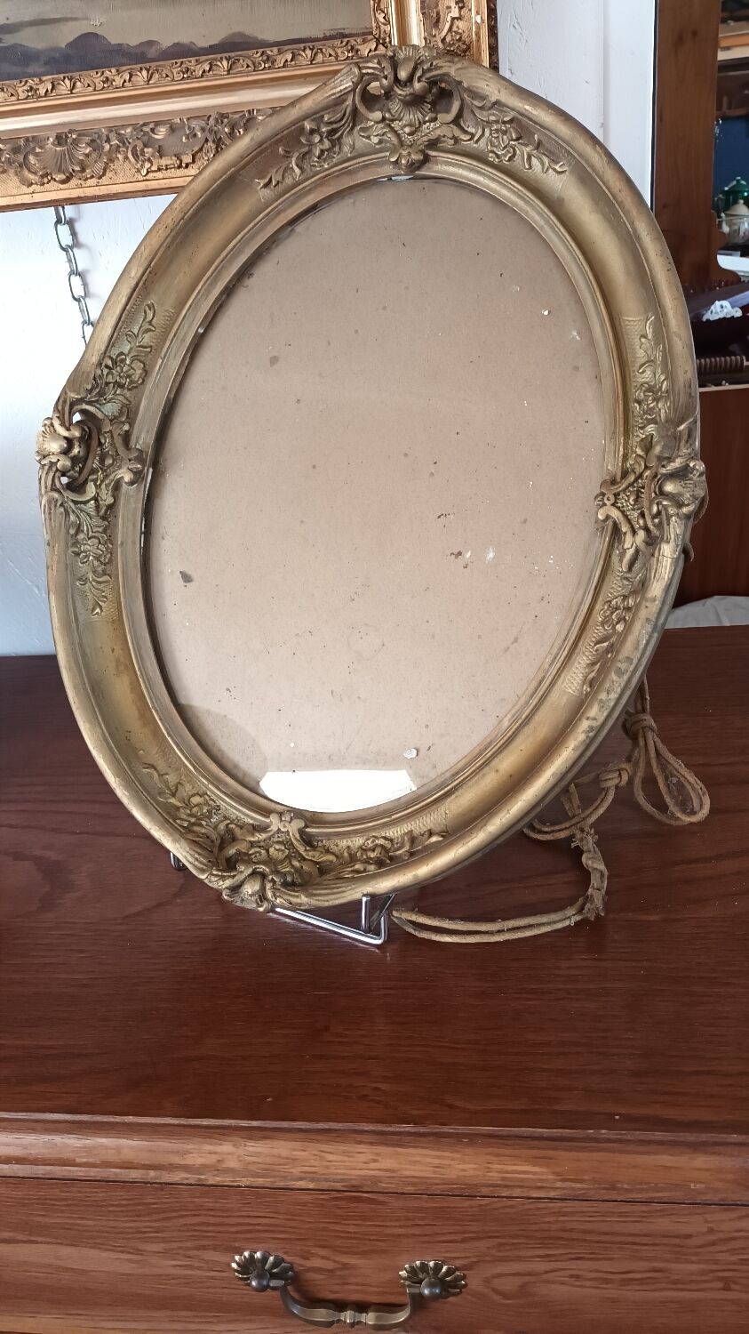 Golden oval frame XXth