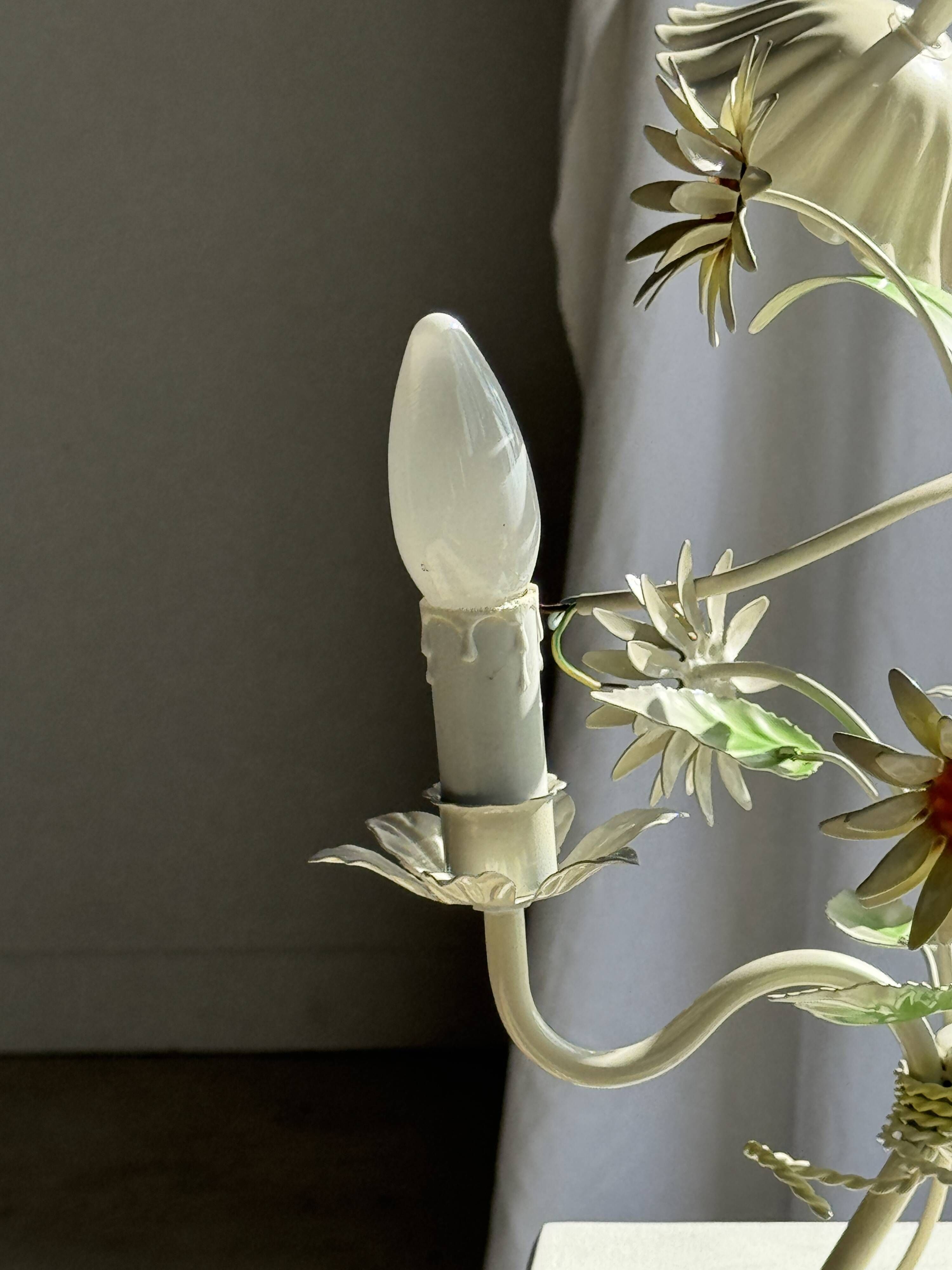 Small vintage cream metal flower chandelier with orange flowers and 3 arms.