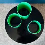 Green plexiglass coffee table in Memphis design style from the 1980s.