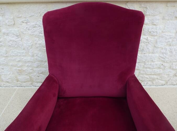 Bergère with blackened wooden legs on casters, Napoleon III period, velvet upholstery