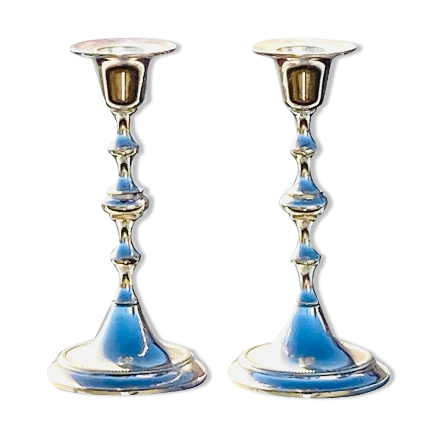 Two antique metal candle holders