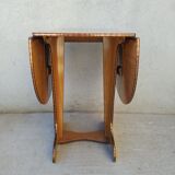 Oval table with formica flap