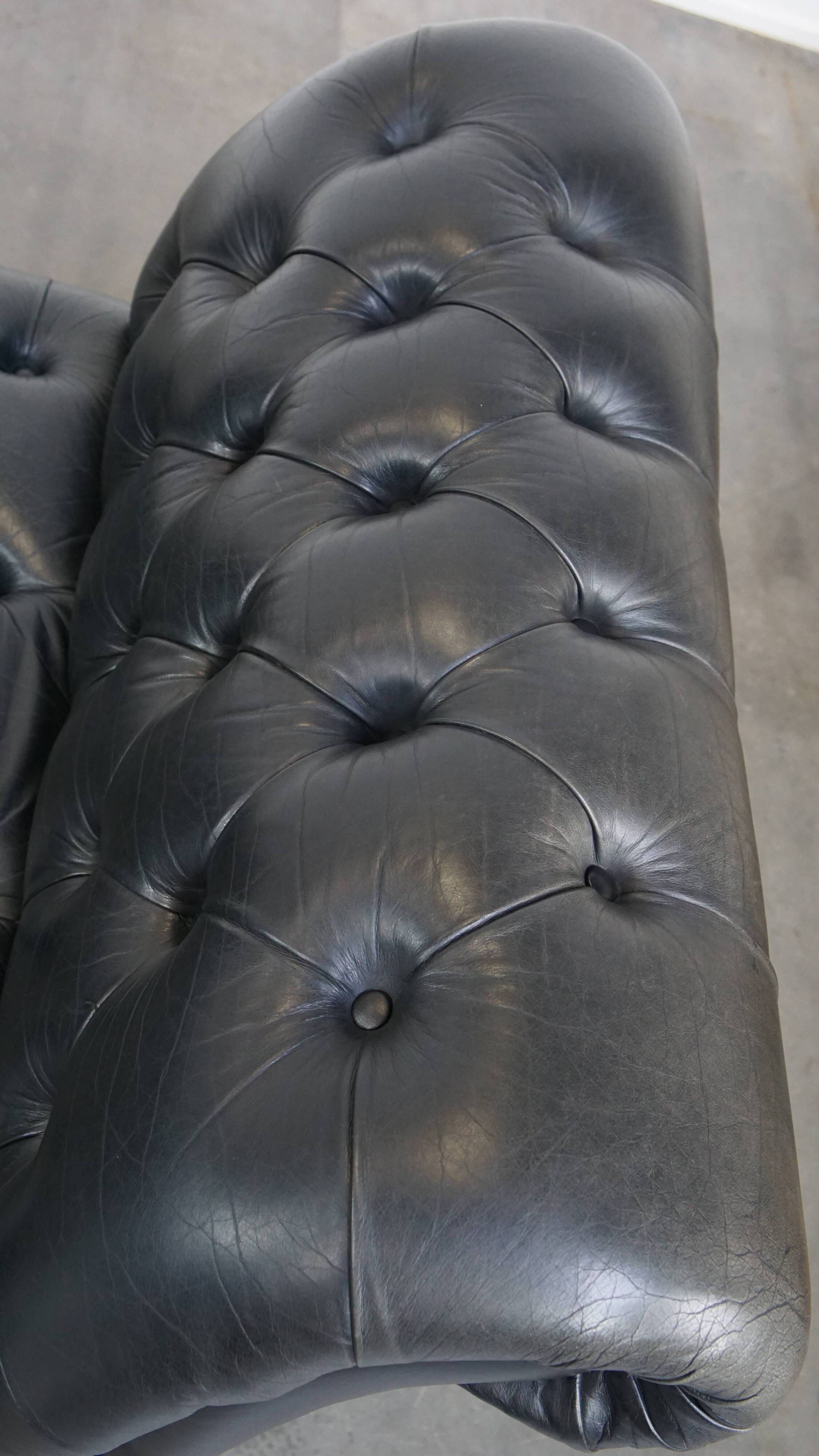 Black chesterfield daybed made of cowhide