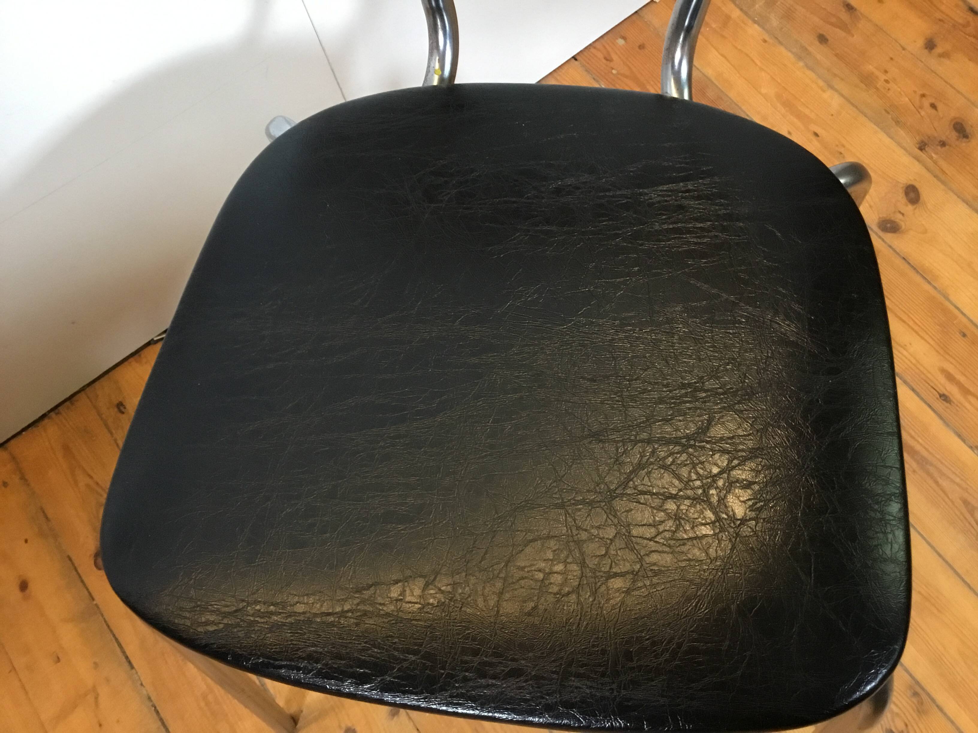 vintage chromed tubular steel stackable dining chairs