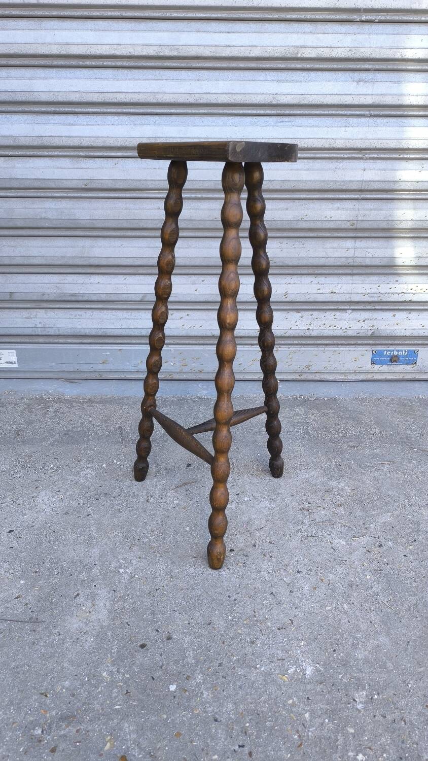 Turned wooden tripod stool