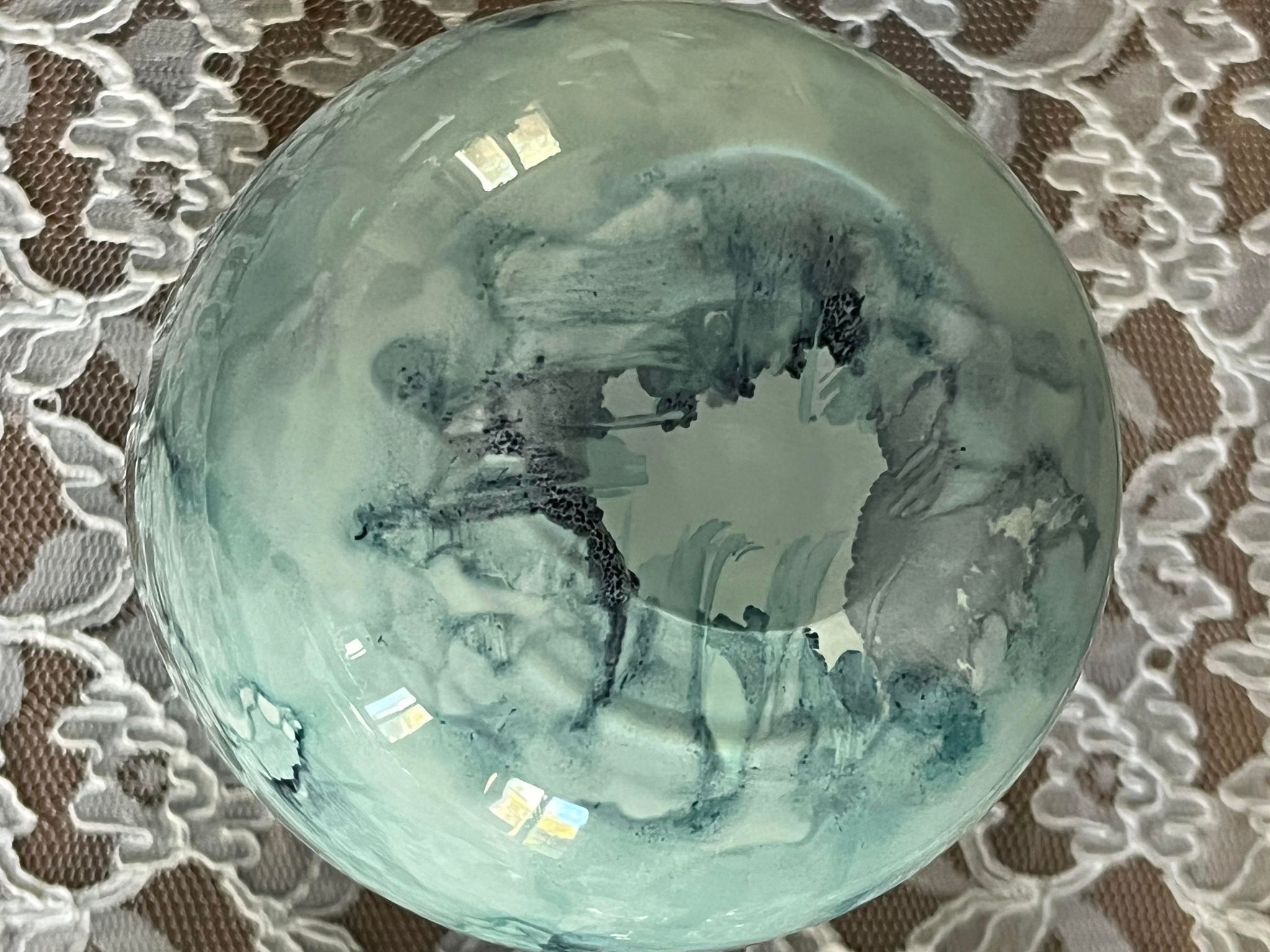 Blue speckled and marbled glass vase