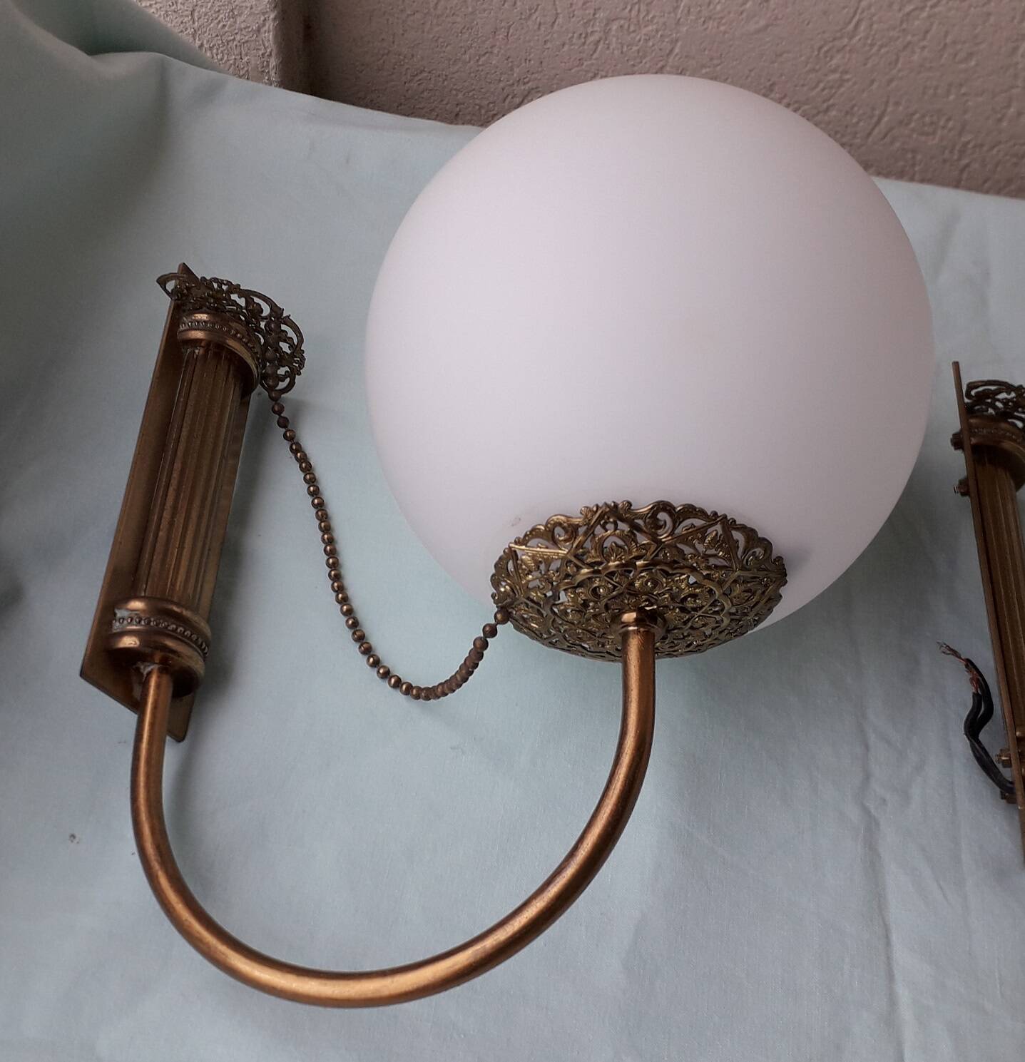 Pair of metal and opaline wall lights