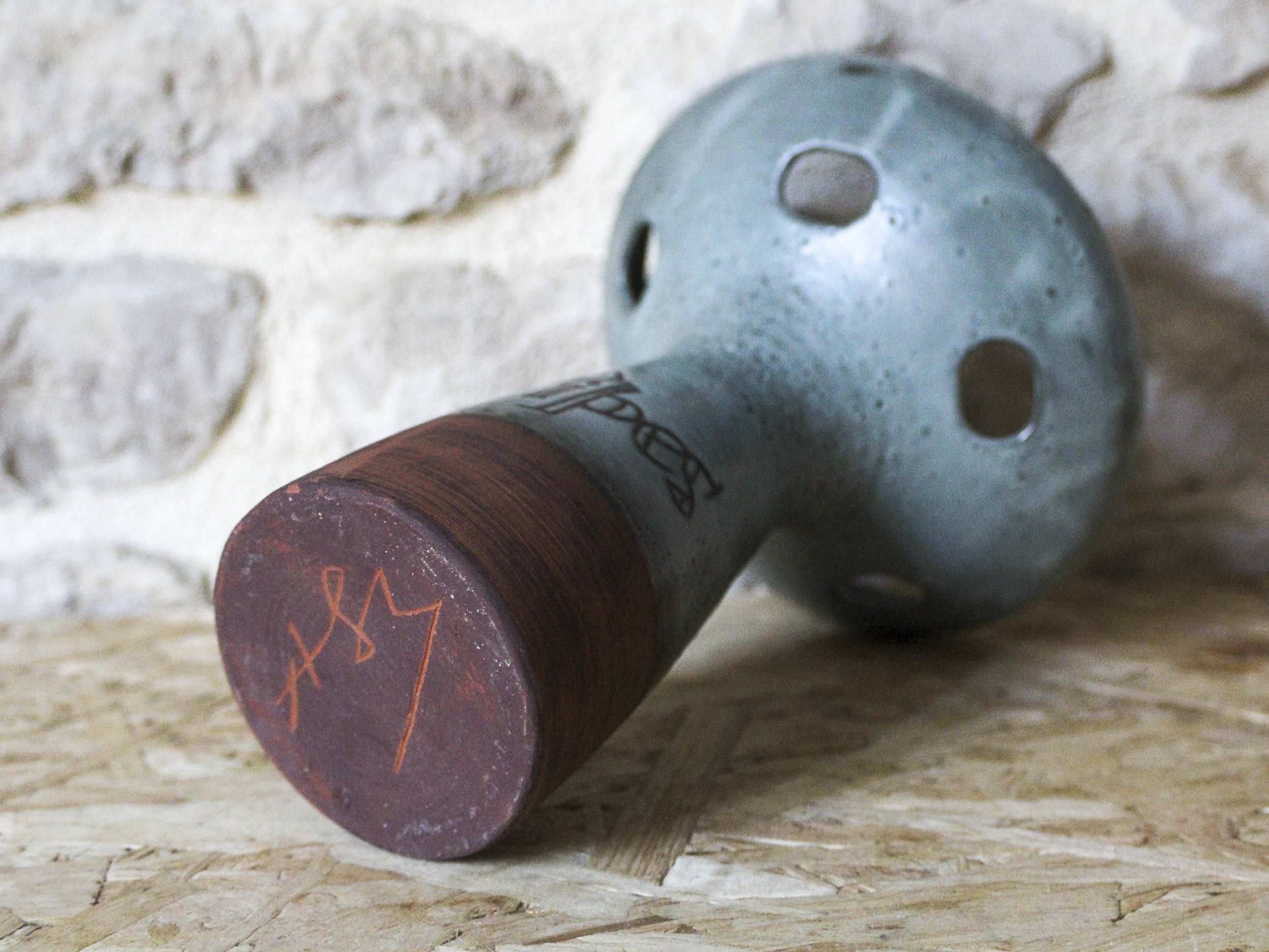 Ceramic pipe holder vase
