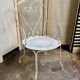 Fauteuil de jardin en fer forgé blanc