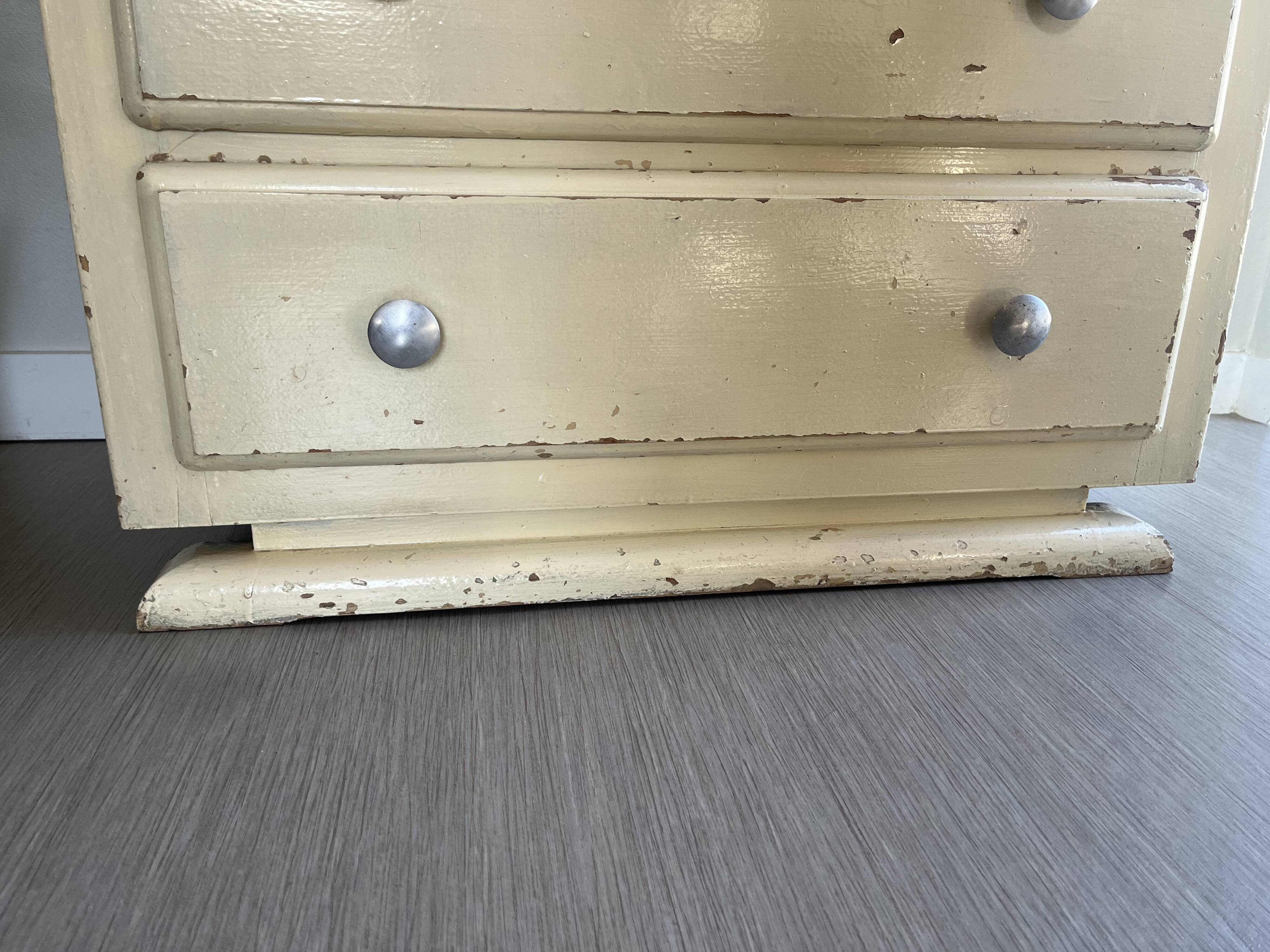 Vintage patinated wood chest of drawers