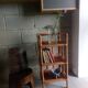 Shelf selette on wooden feet and vintage rattan