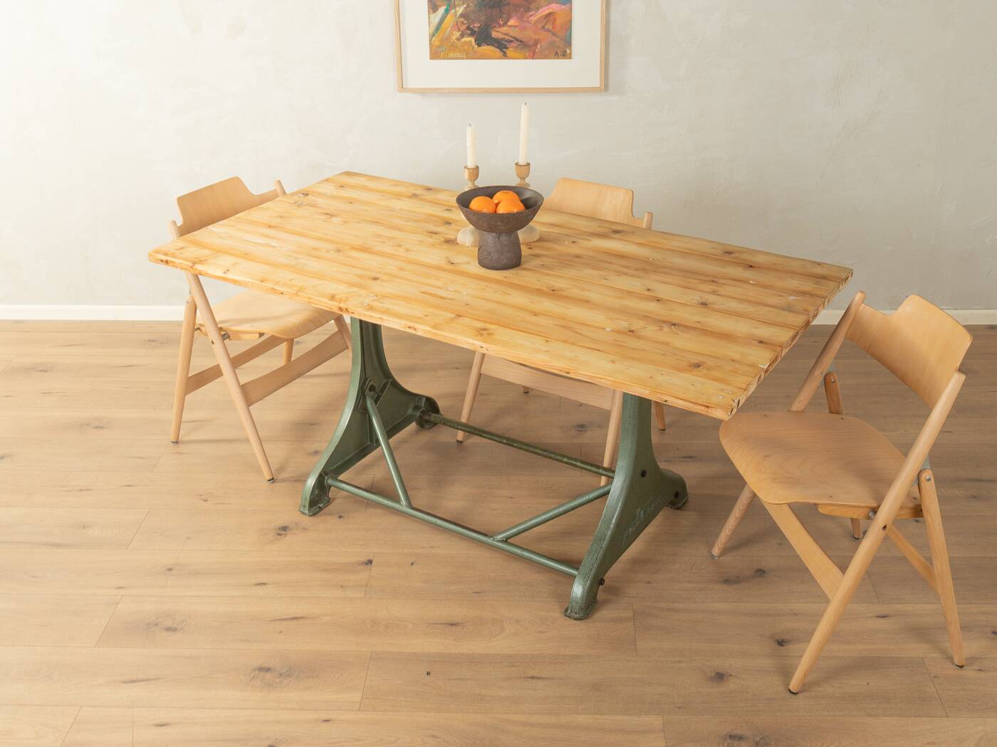 Unique dining table with cast iron base and solid wood top
