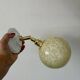 Vintage glass globe wall light in pale yellow from Clichy.