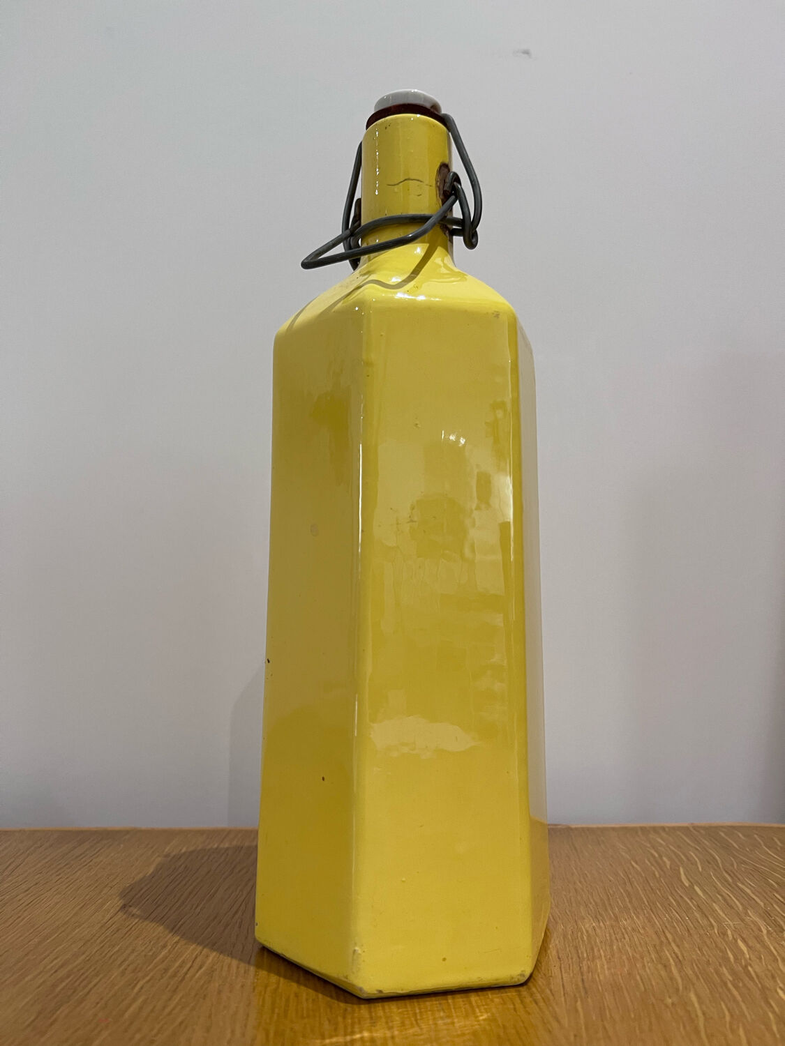 Yellow ceramic bottle