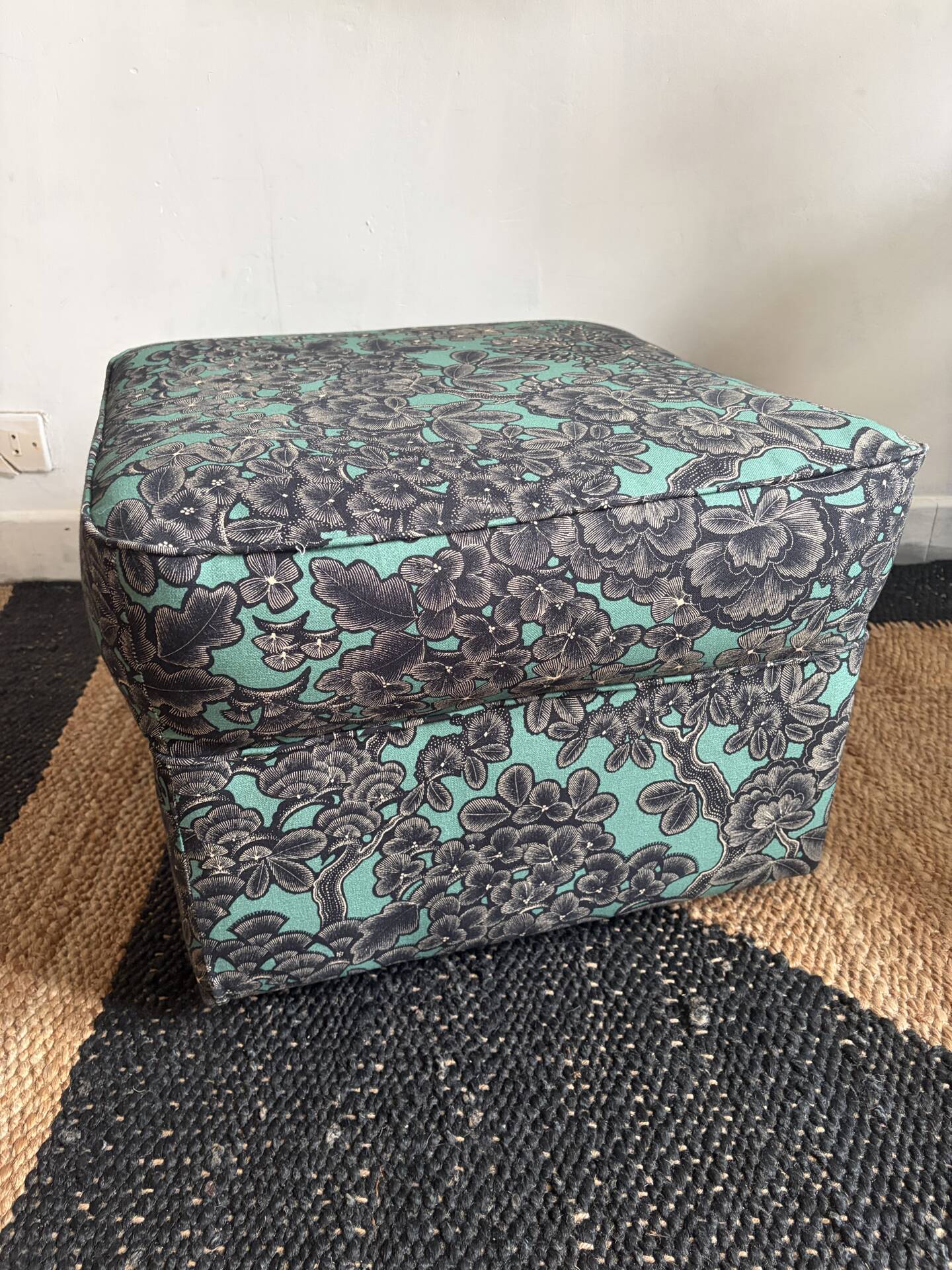 Upholstered pouffe