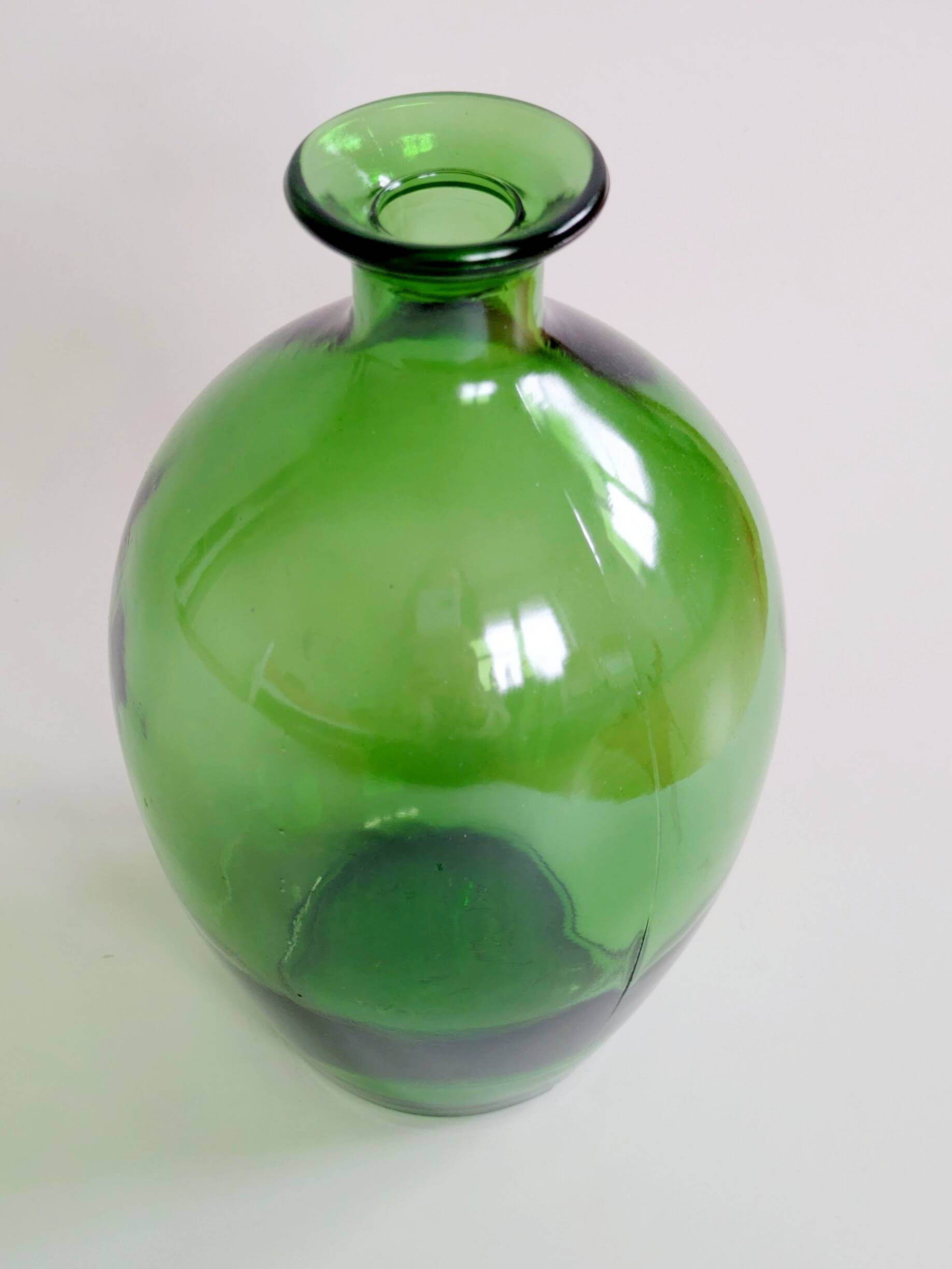 Vintage green glass bottle vase, decorative soliflore.