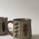 Set of 2 glazed ceramic coffee mugs from around 1970.