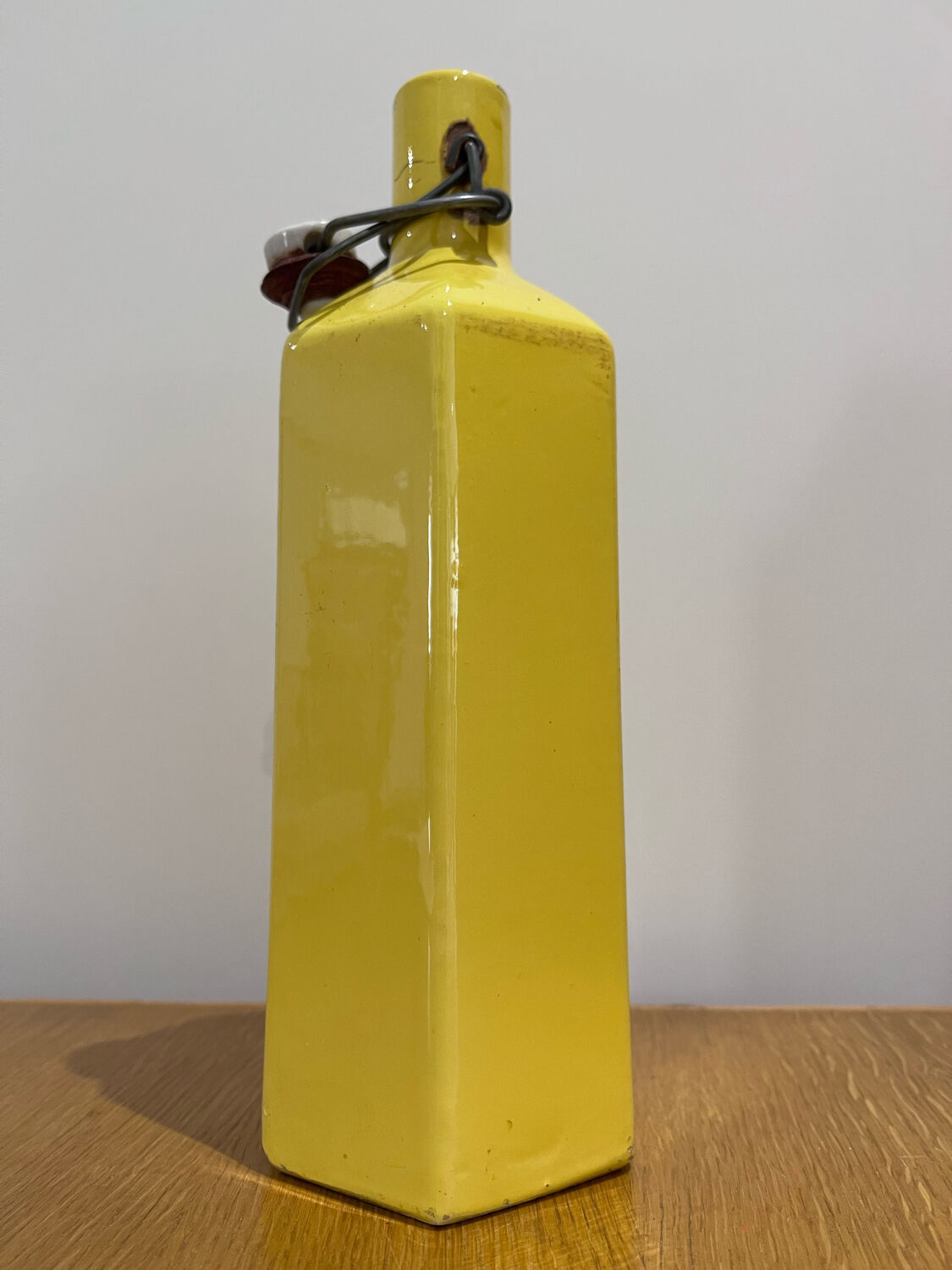 Yellow ceramic bottle