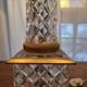 Pair of coloured table lamps, made of cut crystal and gilded bronze, in the Baccarat style.