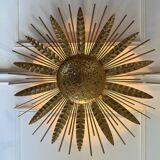 Large golden hammered metal sun wall light with a diameter of 90 cm from the year