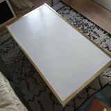 Table basse bois laqué blanc, laiton doré