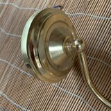 Brass and glass sconce