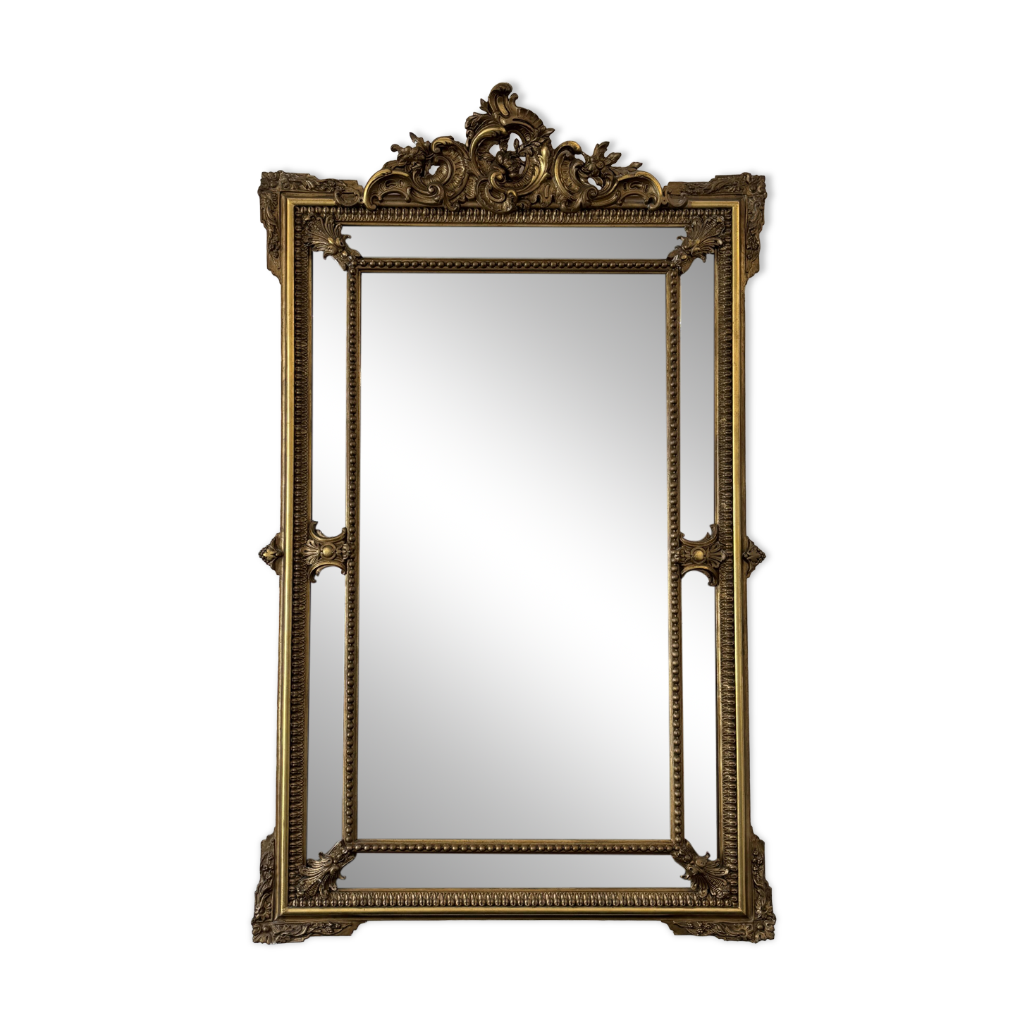 Louis XV style mirror with moulded gilded wood and stucco from the Napoleonic III era.