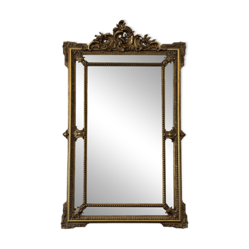 Louis XV style mirror with moulded gilded wood and stucco from the Napoleonic III period.