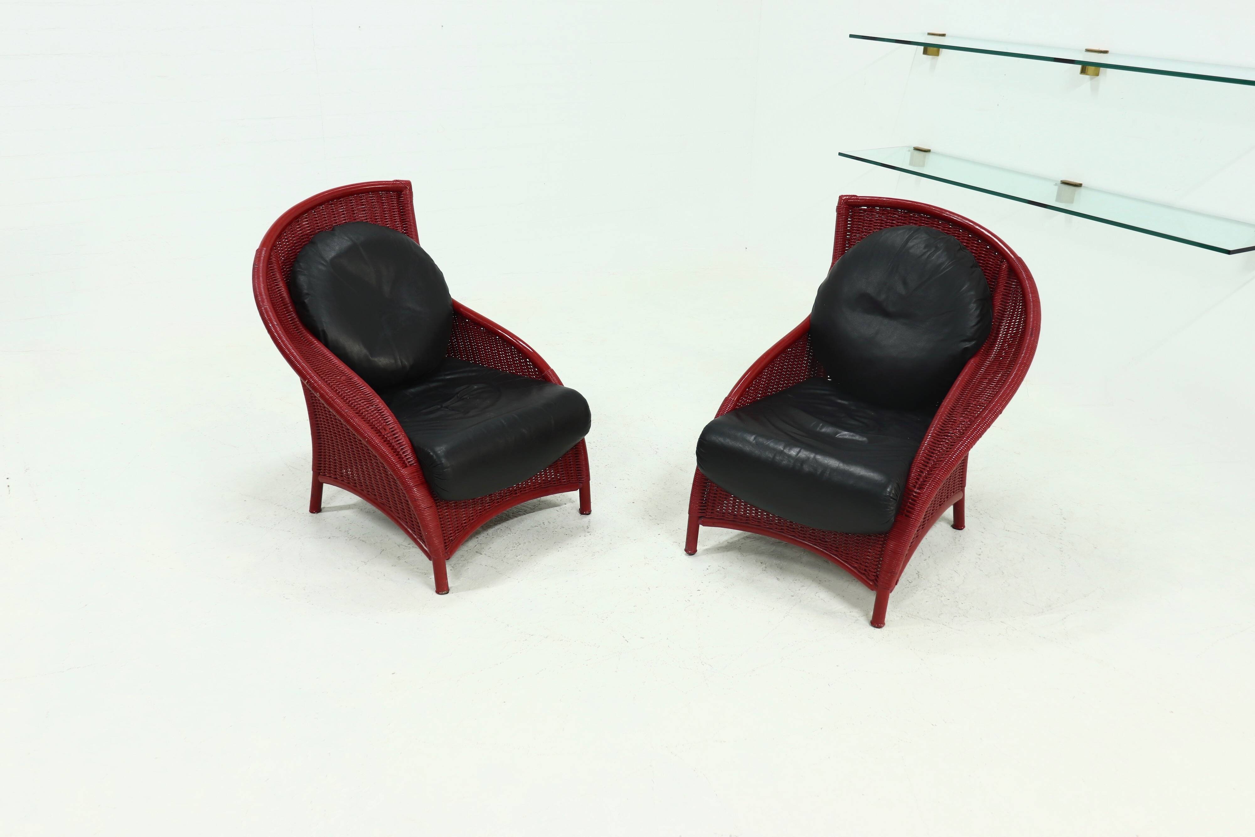 Set of 2 Sculptural Lounge Chairs in Red Lacquered Rattan 1970s